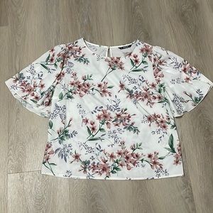 Womens white floral blouse with ruffled sleeves